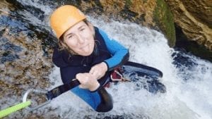 a picture of me canyoning in new zealand with abel tasman canyons