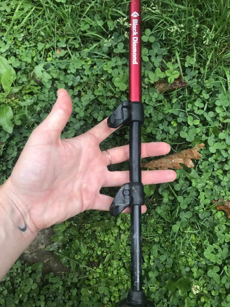 This picture shows how to adjust your hiking poles with the two levers.