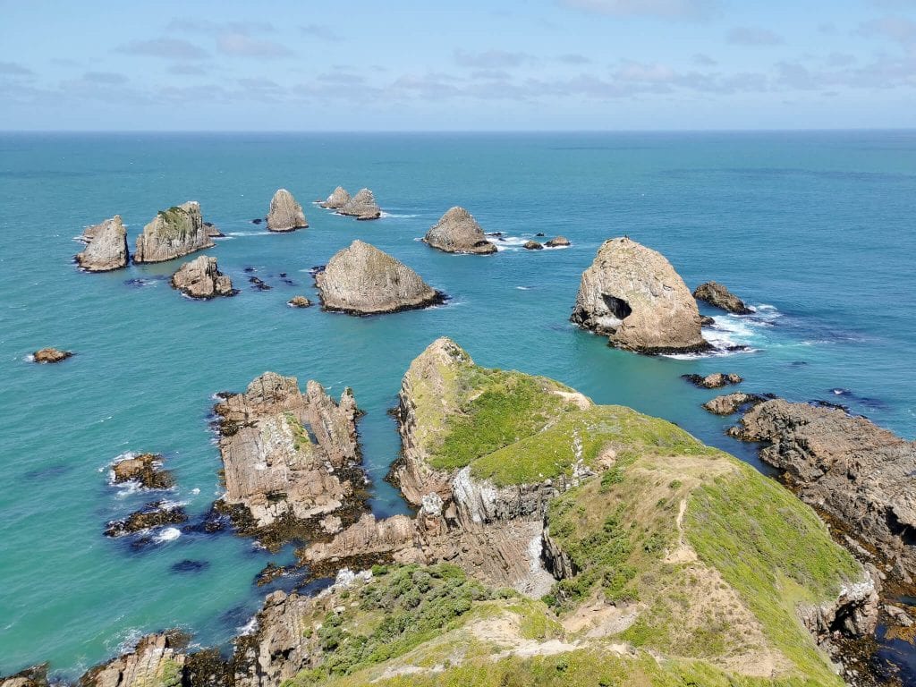a beautiful photo of nugget point one of the most amazing things to do in Southland 