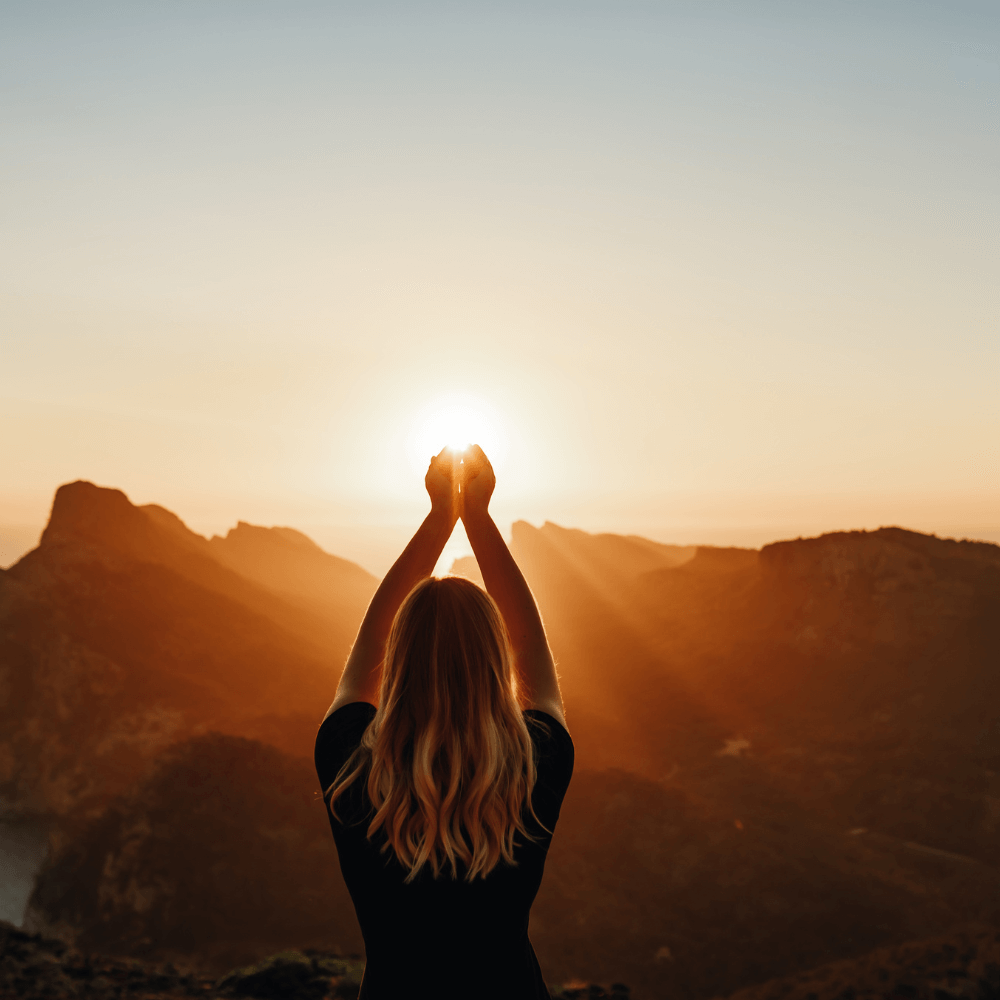 spiritual alignment girl looking at sunset